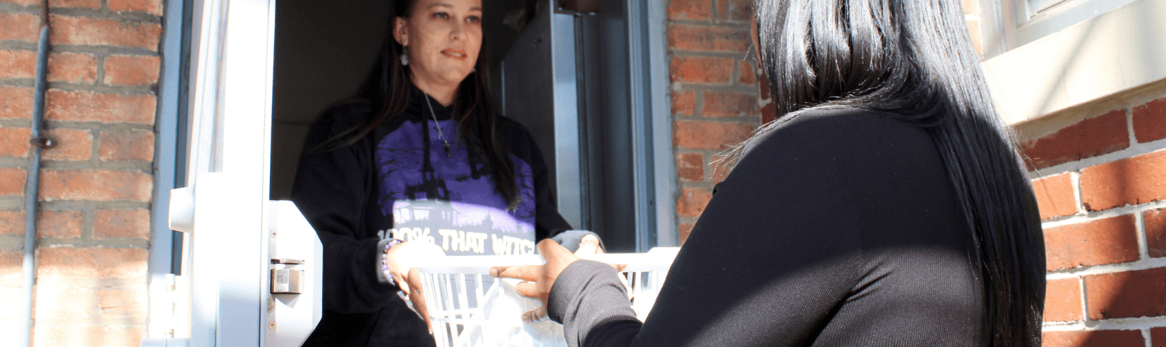 A Home for Families Case manager gives woman a move-in kit